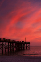 Fiery Sunset by Pier