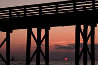 Sunset through a Pier