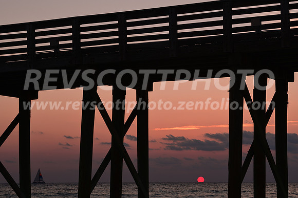 Sunset through a Pier
