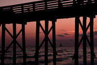 Sunset through a Pier