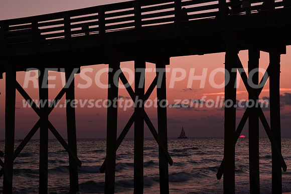 Sunset through a Pier
